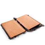 Grill-Asador-Panini-Cobre--–-Home-Elements-En-nuestro-Grill-Asador-Panini-puedes-realizar-diferentes-preparaciones-2-parrillas-en-un-solo-producto-gracias-a-su-apertura-de-180º.-Grill-Asador-Panini-cuenta-con-parrillas-con-doble-revestimiento-antiadherente-stone-y-cobre-que-permiten-preparar-mas-facil-y-rapido-tus-comidas-favoritas-ademas-sin-necesidad-de-utilizar-grasas-adicionales-cocinas-mas-saludable.