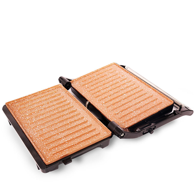 Grill-Asador-Panini-Cobre--–-Home-Elements-En-nuestro-Grill-Asador-Panini-puedes-realizar-diferentes-preparaciones-2-parrillas-en-un-solo-producto-gracias-a-su-apertura-de-180º.-Grill-Asador-Panini-cuenta-con-parrillas-con-doble-revestimiento-antiadherente-stone-y-cobre-que-permiten-preparar-mas-facil-y-rapido-tus-comidas-favoritas-ademas-sin-necesidad-de-utilizar-grasas-adicionales-cocinas-mas-saludable.